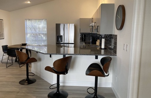 Vero Beach House | MODERN RETREAT: 2/2, w/private study, garage, screened patio, and front porch.