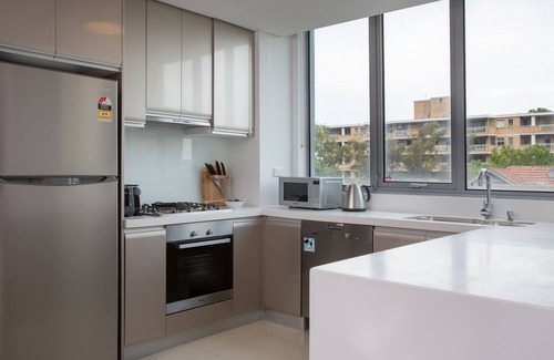 Chatswood Apartment | Modern Retreat with Balcony & Parking, Near Trains