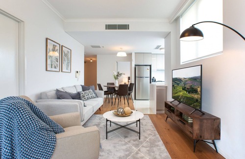 Chatswood Apartment | Modern Retreat with Balcony & Parking, Near Trains
