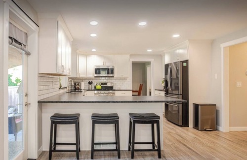 Olympia House | Modern Self check-inLarge Fenced Yard A/C Close to Everything Quiet Neighborhood