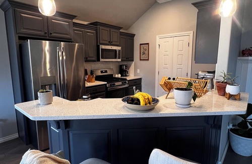 Wheatland House | Modern Tranquility: Spacious 3BR Home, Near Transit & Shopping.