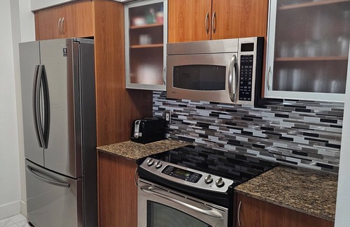 East Ocean Ave Condo | Modern Waterfront Condo at The Moorings – Steps from Beach & Dining