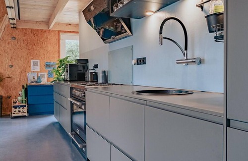 Petersdorf Apartment | Modern wooden house with large garden and terrace near the beach (child-friendly)