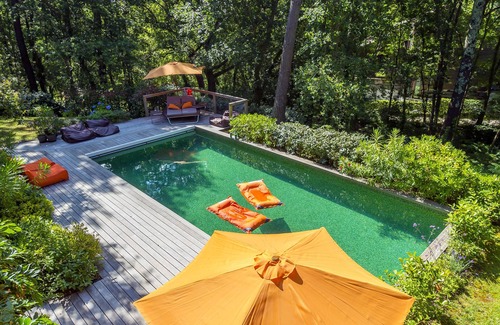 Biscarrosse House | Modern wooden villa on large lot with heated pool located in the Golf of Biscarrosse.