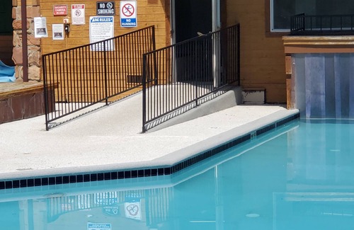 Granby Apartment | Mountain Resort Studio - 365 day pool, 4 Tubs, Free Parking and Wifi. Sleeps 1-4