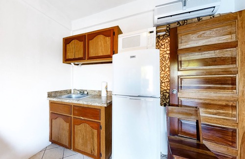 Caye Caulker House | Multi-suite property w/private pool, rooftop, grill, kayaks, partial AC & WiFi