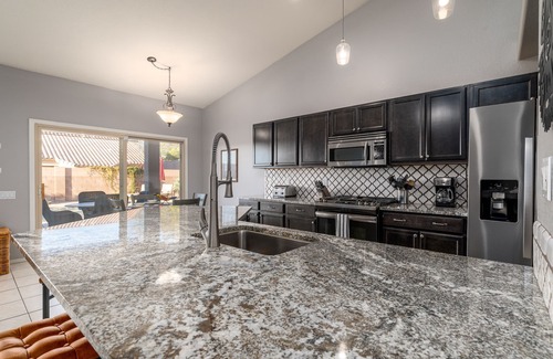 Casas Adobes House | Mystic Mirage is truly a desert oasis with pool and mountain views.