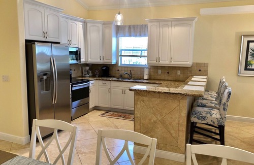 Naples Park House | Naples Best Value! High End 4 Bdrm Heated Pool Walk To Gulf Walk To Mercado