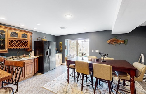 Livingston House | Nature lover’s lakefront home with a beach, dock, fire ring, & more