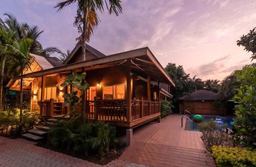 Morjim Villa | Nature's Abode - The Wooden Villa at Morjim by StayVista