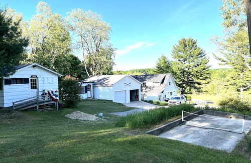 Rapid City House | Near Torch Lake. Home w/guest cabins for family retreat. Dogs ok