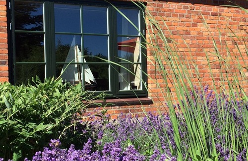 Schaalby Hotel | New apartment on idyllic Resthof - secluded location. Near Schlei /Baltic Sea
