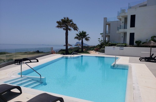 San Roque Apartment | New front line beach/Golf with views of Gibraltar and Africa.