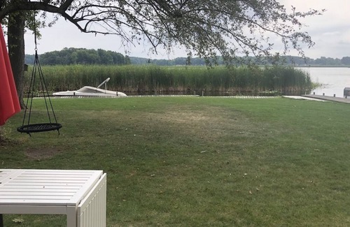 Hillsdale Cottage | NEW! Hillsdale Lakefront Cottage on Baw Beese Lake with fishing docks & sunroom!