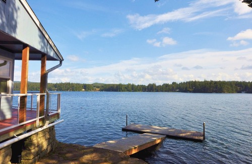 Dunes City House | New Listing! Adorable lakefront cabin, private dock, hot tub, gas grill, amazing views