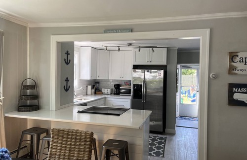 Silver Beach Cottage | New Silver Beach Cottage just a short walk to association beach and harbor!