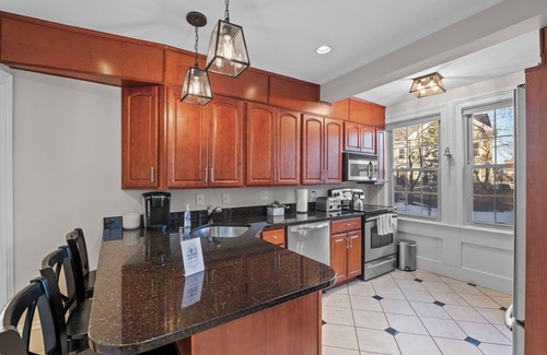 Salem Apartment | NEW Spacious 1BR on Salem Common l Steps to Downtown l Fenced in Yard + Parking