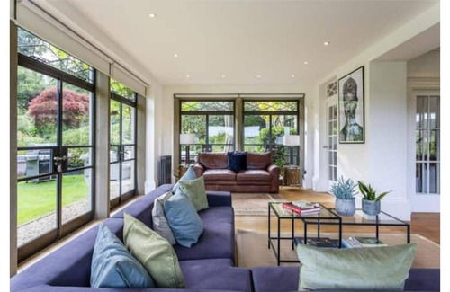 Rodborough House | NEW TO VRBO! Stunning 5-bedroom villa with hot tub, pure Cotswolds luxury