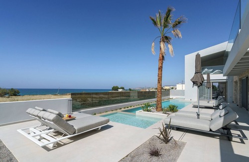 Sfakaki Villa | Newly built Beachfront Villa with Heated Pool, Jacuzzi/Hot Tub and Playroom