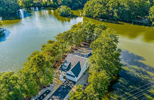 Seaford House | Newly built riverfront home with dock, kayaks, basketball court, & game room