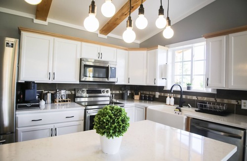 Badger House | Newly constructed cabin on a quiet residential pond.