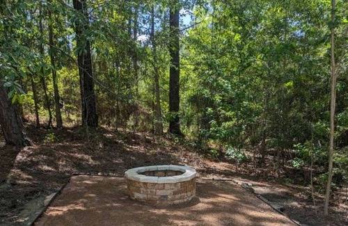 Brookeland House | Newly-remodeled & fresh dog-friendly hideaway with treetop views & firepit