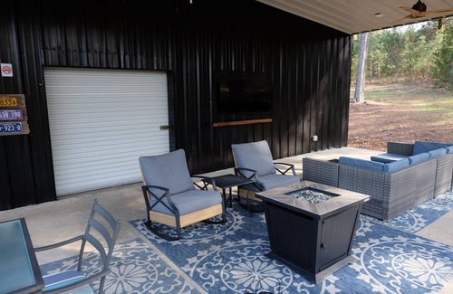 Russellville Apartment | Newly Remodeled Studio with huge garage space. Perfect for Boats, UTVs, & More