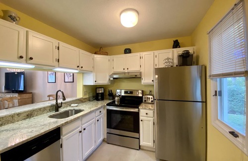 Brewster Condo | Newly updated, traditional townhouse with recently renovated bathrooms - a favorite for our guests.