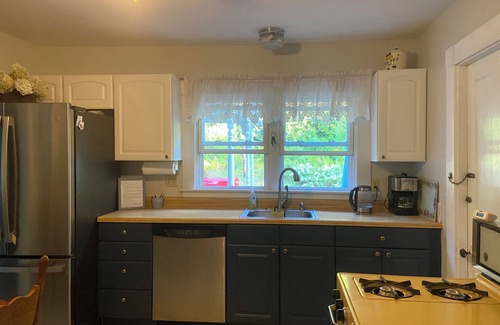 Lochmere House | NH Farm House on Lake Winnisquam! Book now for boat slip access!