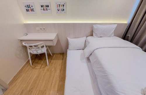 Bumi Serpong Damai Apartment | Nice and Spacious 2BR with Extra Room at Branz BSD City Apartment By Travelio