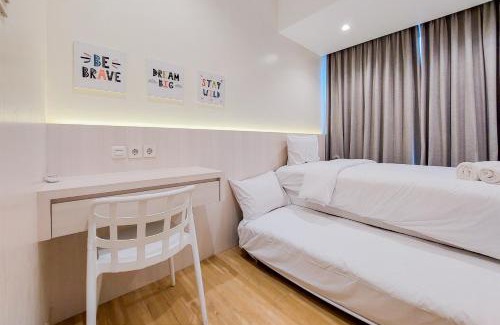 Bumi Serpong Damai Apartment | Nice and Spacious 2BR with Extra Room at Branz BSD City Apartment By Travelio