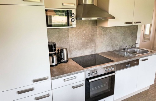 Hechthausen House | Nice apartment in villa for 8 people with WIFI, pool, TV, terrace, pets allowed and parking