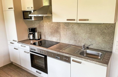 Hechthausen House | Nice apartment in villa for 8 people with WIFI, pool, TV, terrace, pets allowed and parking