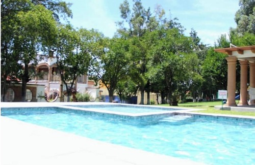 La Magdalena House | Nice house in front of the pool, lake and green area!