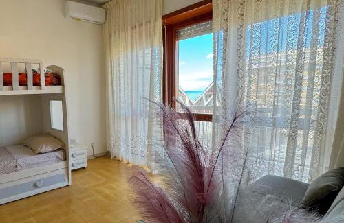 Nettuno Apartment | NINFEA SEAVIEW APARTMENT - Elegant, Bright and Spacious, Steps from the Sea & Station