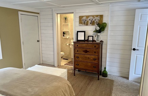 Solon Township House | No wake lakefront cottage with tiered decks and a quiet, friendly neighborhood