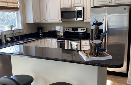 Windy Hill House | North Beach Resort Townhouse - pools, hot tubs & beach. A family paradise!