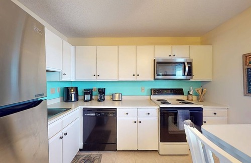 Caine Woods Condo | North Ocean City bayside condo with first floor convenience