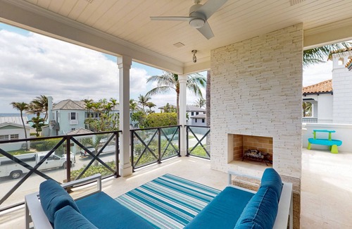 Ocean Ridge House | Ocean view estate w/in ground outdoor pool, breezy terraces, and covered lanai