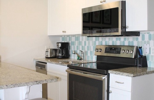 Isle of Palms Condo | Oceanfront 1st Floor Condo! Community Pool & Fishing Pier! In the Heart of IOP!