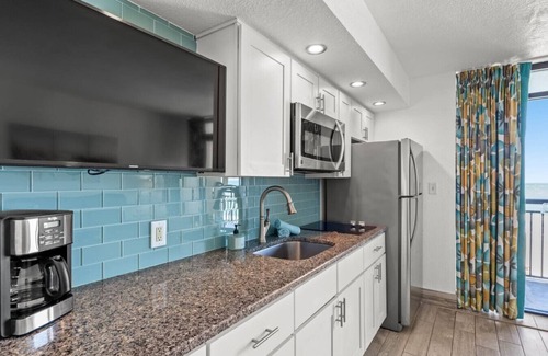 Windy Hill Condo | Oceanfront Balcony - Pools - Kitchen - Hot tubs