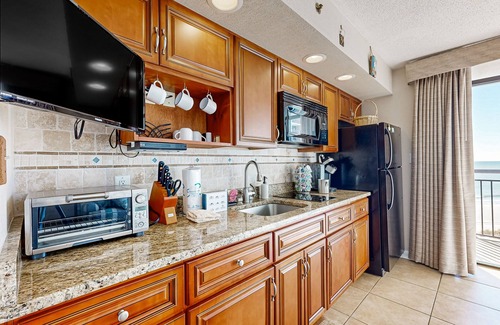 Windy Hill Condo | Oceanfront condo with outdoor pool, hot tub, private balcony & central AC