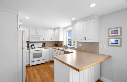 Minot House | Oceanfront Family Retreat in Scituate with Private Beach, Expansive Porches, Outdoor Shower