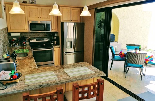Cabo Bello Condo | OCEANFRONT GROUND FLOOR 2 BEDROOM END UNIT INDOOR/OUTDOOR LIVING AT IT'S BEST