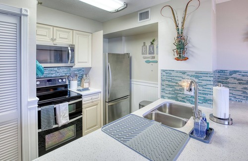 Tavernier Condo | Oceanfront Key Largo Paradise with Private Beach~Pool~Tennis~Marina and more.