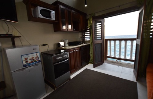 Tower Isle Apartment | Oceanfront Mezzanine |Tiny House, Steps to Shops, Bars & Attractions