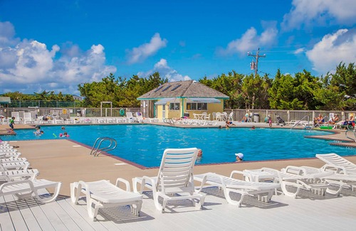 Avon House | Oceanside home with pool access, rooftop deck, screened porch - walk to beach
