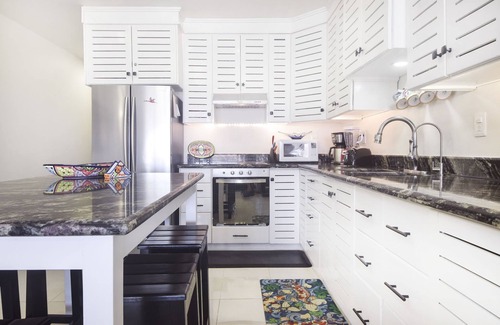 Playacar Fase I Condo | Oceanside Oasis Xaman Ha 7104