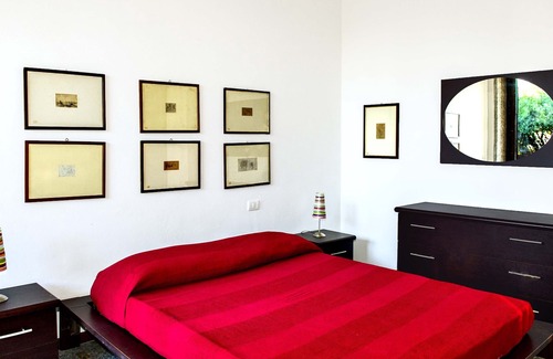 Le Rocchette Apartment | ocher apartment by the sea with private beach and private parking