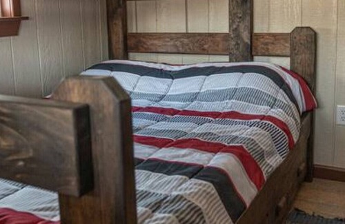 Mill Hall Cabin | Off grid; River front getaway, boat. Firepit, woodland; Generator. 2 Bedrooms.